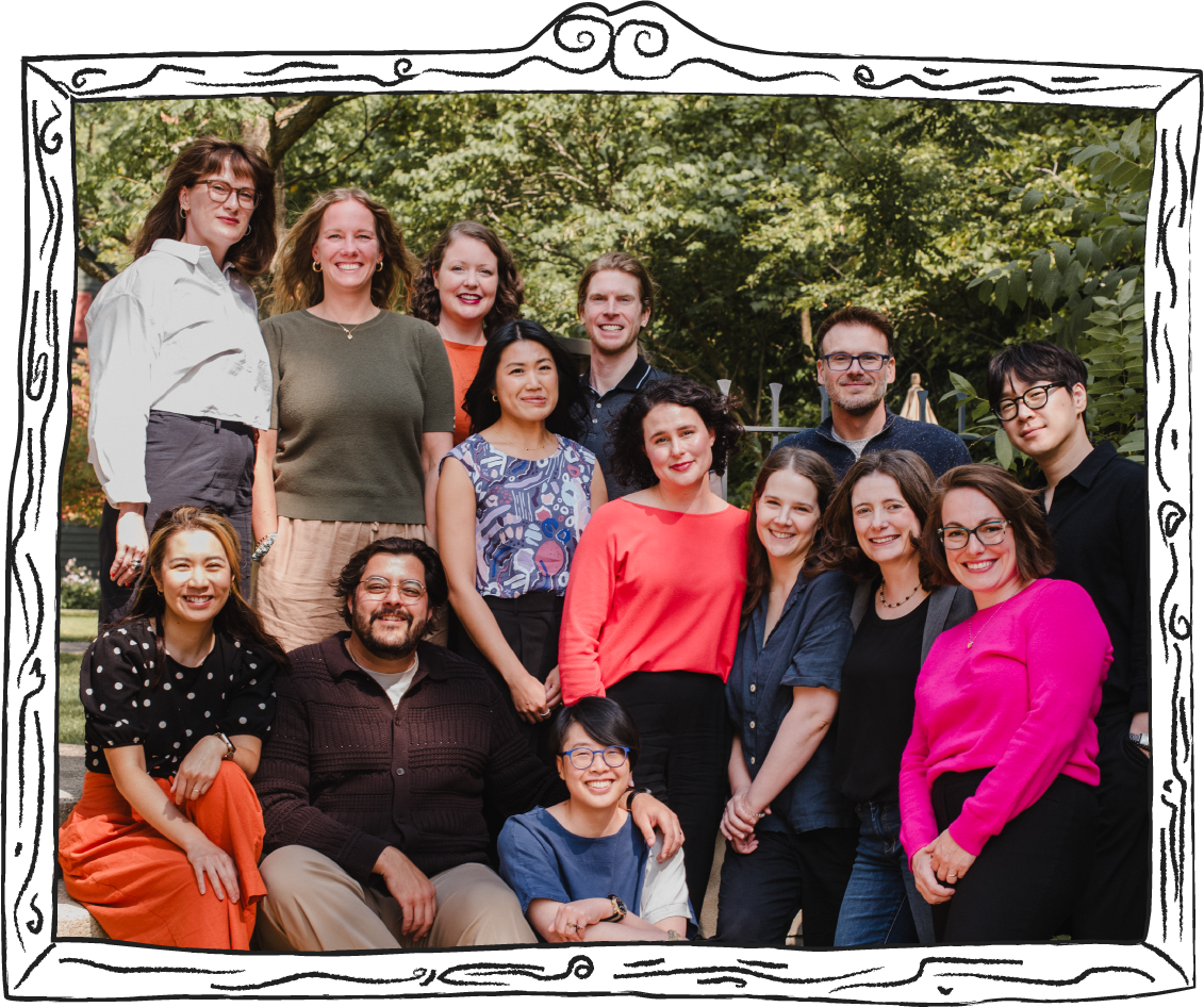 A photo of the Workomics team in a hand drawn picture frame.